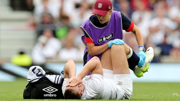 England starting scrum-half Jack van Poortvliet was helped off by two medics due to an ankle injury 