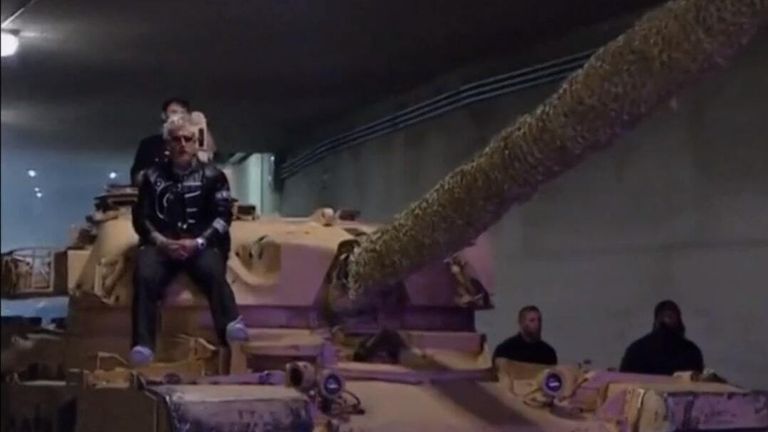 Jake Paul arriving on a tank