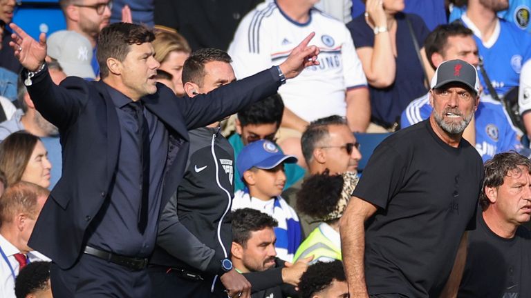 Chelsea manager Mauricio Pochettino, left, and Liverpool's manager Jurgen Klopp react during the English Premier League soccer match between Chelsea and Liverpool at Stamford Bridge Stadium in London, Sunday, Aug. 13, 2023. (AP Photo/Ian Walton)