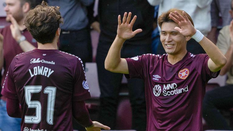 Hearts' Kyosuke Tagawa (right) celebrates with Alex Lowry after making it 4-0 against Partick Thistle