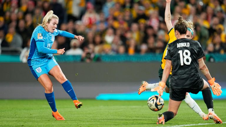 England's Lauren Hemp scores her side's second goal