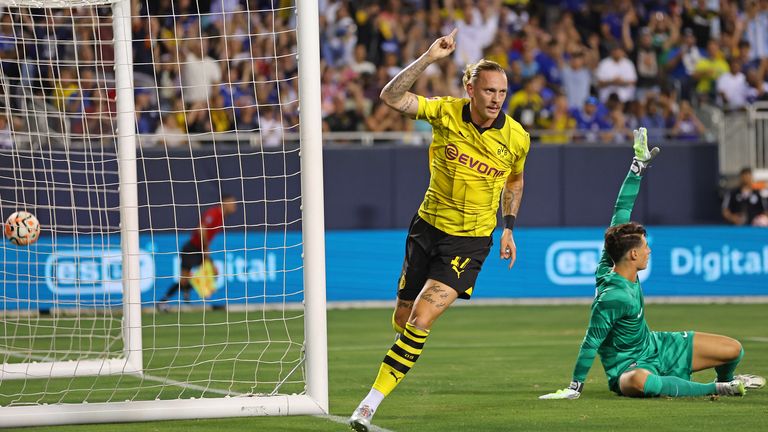 Marius Wolf wheels away after scoring for Borussia Dortmund against Chelsea