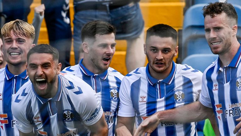 Kilmarnock&#39;s Marley Watkins (right) celebrates with his team-mates after scoring against Celtic