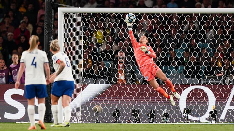 Mary Earps makes a save mid-way through the second half