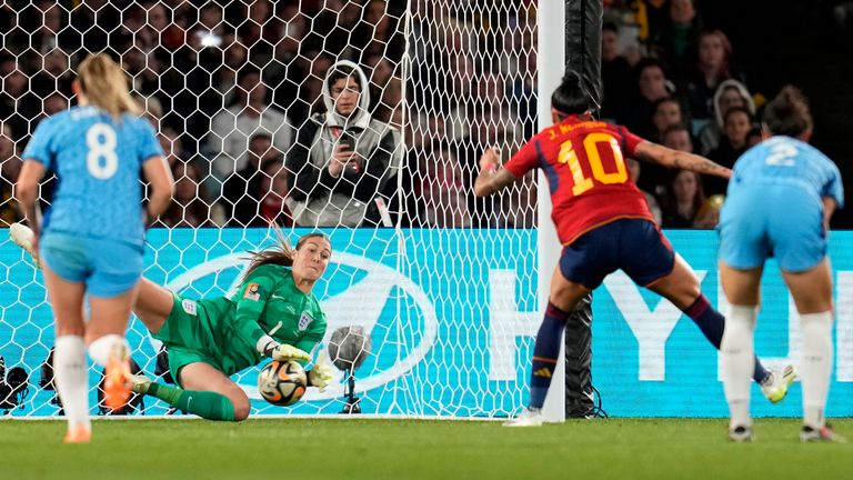 England's goalkeeper Mary Earps saves a penalty shot from Spain's Jennifer Hermoso , 2nd right, during the Women's World Cup soccer final between Spain and England at Stadium Australia in Sydney, Australia, Sunday, Aug. 20, 2023. (AP Photo/Abbie Parr)