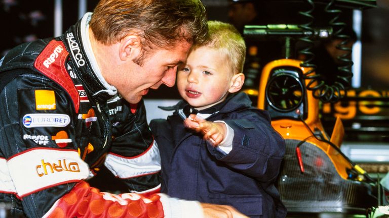 Aged two, Max Verstappen tries out his dad's Arrows F1 car for size at the European GP in 2000