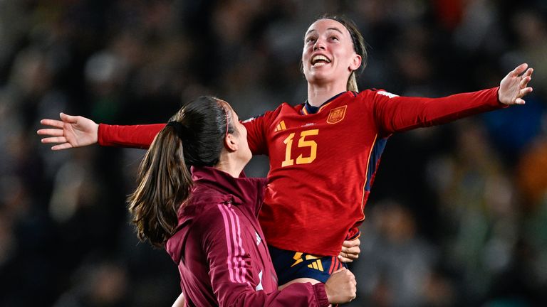 Spain's Eva Navarro, right, celebrates with a teammate after defeating Sweden in the Women's World Cup semifinal soccer match at Eden Park in Auckland, New Zealand, Tuesday, Aug. 15, 2023. (AP Photo/Andrew Cornaga)