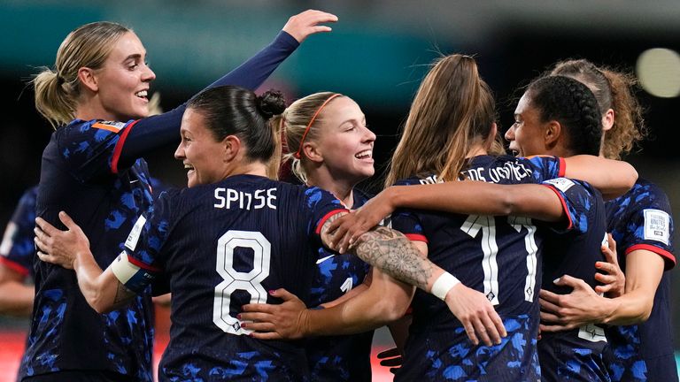 Netherlands' Esmee Brugts, right, is celebrated by her team after scoring the third goal during the Women's World Cup Group E soccer match between Vietnam and the Netherlands in Dunedin, New Zealand, Tuesday, Aug. 1, 2023. (AP Photo/Alessandra Tarantino)