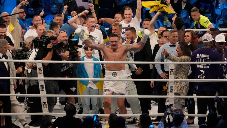 Ukraine&#39;s Oleksandr Usyk celebrates after beating Britain&#39;s Daniel Dubois during their world heavyweight title fight at Tarczynski Arena in Wroclaw, Poland, Sunday, Aug. 27, 2023. Oleksandr Usyk defends his WBC, IBF and WBA heavyweight titles for the first time in a year when he faces hard-hitting British challenger Daniel Dubois in a clash of styles. (AP Photo/Czarek Sokolowski)