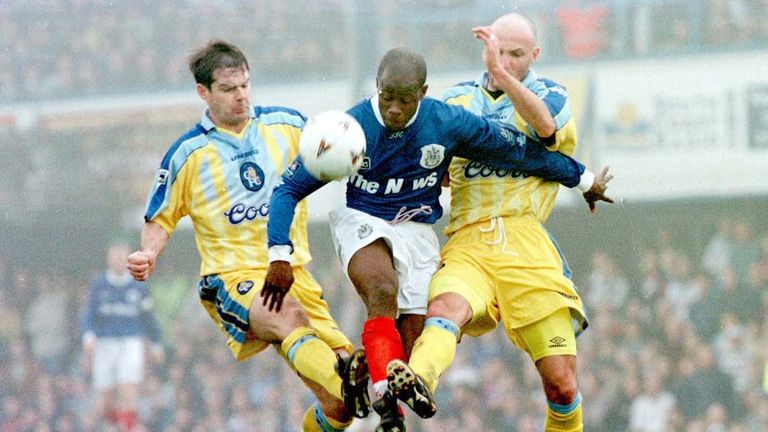 Portsmouth's Paul Hall (centre) attempts to escape the attentions of Chelsea's Steve Clarke (left) and Frank LeBoeuf during their FA Cup quarter final match at Fratton Park in 1997