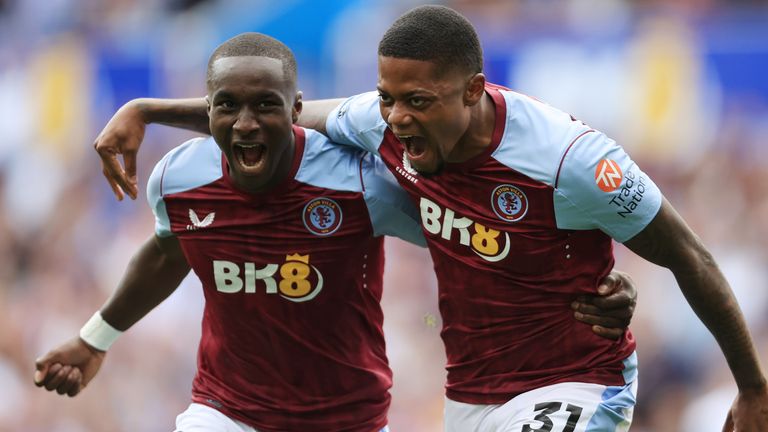 Leon Bailey celebrates with team-mate Moussa Diaby after scoring Aston Villa&#39;s third goal against Everton