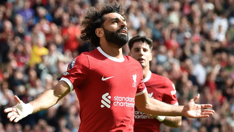 Mo Salah celebrates after giving Liverpool a 2-1 lead against Bournemouth