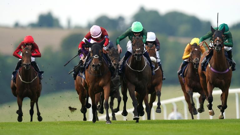 Executive Decision (pink cap) sees off two rivals from Ireland to win at Chepstow