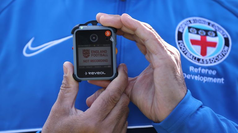 A detailed shot of a referee bodycam is seen prior to being tested by referees of the North Riding FA 
