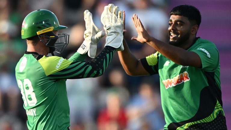SOUTHAMPTON, ENGLAND - AUGUST 16: Rehan Ahmed of Southern Brave celebrates the wicket of Ben Duckett of Birmingham Phoenix with Devon Conway of Southern Brave during The Hundred match between Southern Brave Men and Birmingham Phoenix Men at The Ageas Bowl on August 16, 2023 in Southampton, England. (Photo by Mike Hewitt/Getty Images)