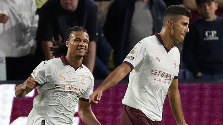 Rodri celebrates scoring Man City's third goal