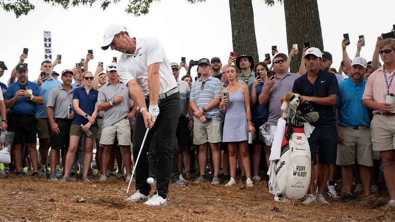 Rory McIlroy hits from the pine straw during the third round of the St. Jude Championship 