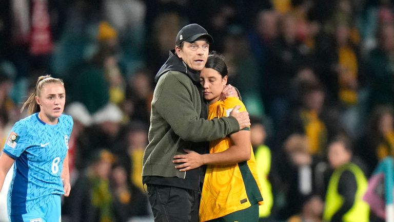 Australia's head coach Tony Gustavsson and Australia's Sam Kerr react to their loss at the end of the Women's World Cup semifinal soccer match between Australia and England at Stadium Australia in Sydney, Australia, Wednesday, Aug. 16, 2023. (AP Photo/Alessandra Tarantino)