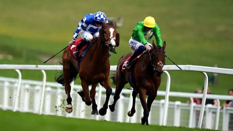 Soto Sizzler (left) takes the City And Suburban Handicap at Epsom