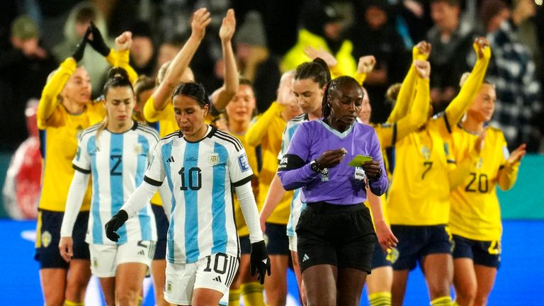 Argentina's Dalila Ippolito reacts besides referee Salima Mukansanga after Sweden scored the second goal during the Women's World Cup Group G soccer match between Argentina and Sweden in Hamilton, New Zealand, Wednesday, Aug. 2, 2023. (AP Photo/Abbie Parr)