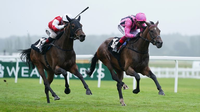 Sweet Memories ridden by jockey Frankie Dettori (right) coming home to win the Darley Fillies' Novice Stakes at Newbury