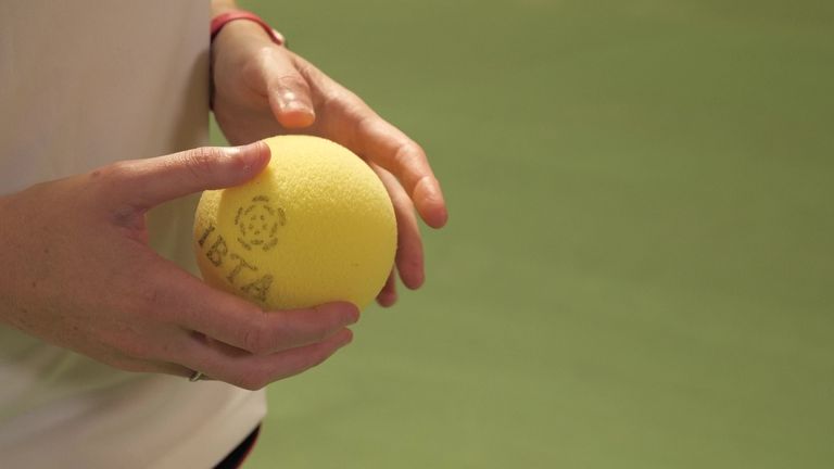 VI/blind tennis is played with a spacial foam ball with a rattle to help players track the ball through hearing