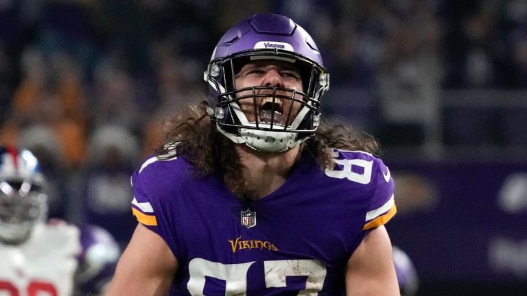 Minnesota Vikings tight end TJ Hockenson (87) celebrates after catching a pass during the first half of an NFL wild card playoff football game against the New York Giants in January 2023 (AP Photo/Charlie Neibergall)
