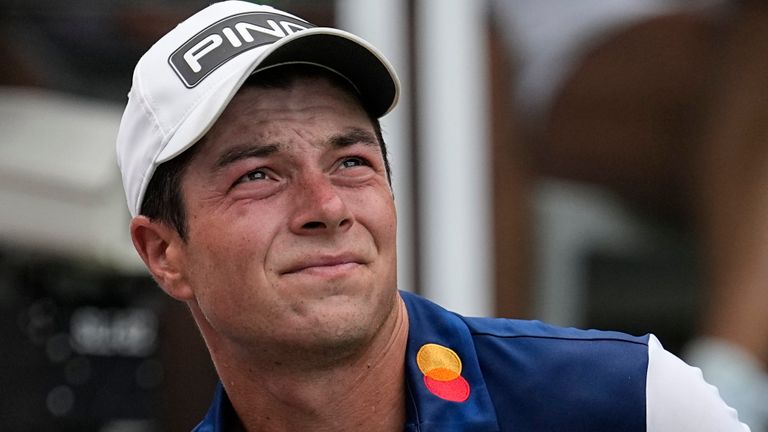 Viktor Hovland, of Norway, stands on the first tee during the third round of the Tour Championship golf tournament, Sunday, Aug. 27, 2023, in Atlanta. (AP Photo/John Bazemore)