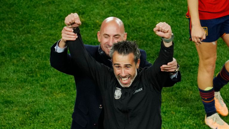 Spain's head coach Jorge Vilda, center, celebrates after their win in the Women's World Cup semifinal soccer match between Sweden and Spain at Eden Park