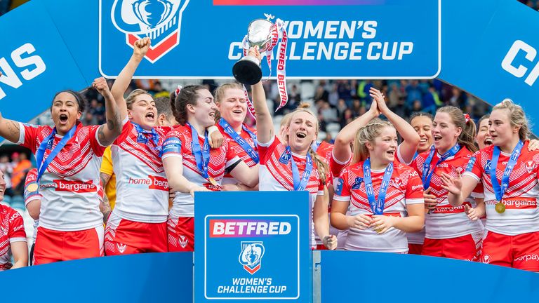 Picture by Allan McKenzie/SWpix.com - 07/05/2022 - Rugby League - Betfred Women's Challenge Cup Final - Leeds Rhinos v St Helens - Elland Road, Leeds, England - St Helens's lift the Betfred Women's Challenge Cup Trophy after victory over Leeds.