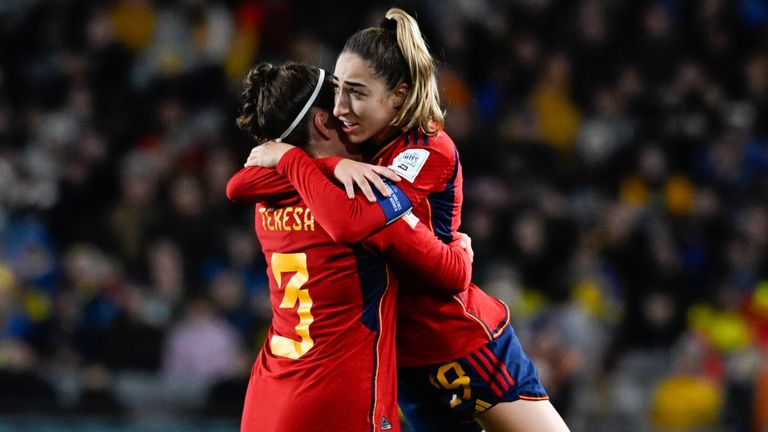 Olga Carmona is congratulated by her team-mate Teresa Abelleira after restoring Spain's lead against Sweden