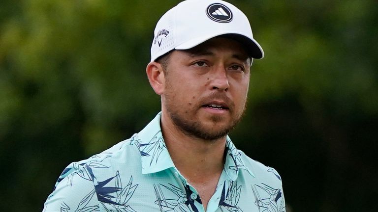 Xander Schauffele walks off the first green during the third round of the Tour Championship golf tournament, Sunday, Aug. 27, 2023, in Atlanta. (AP Photo/Mike Stewart)