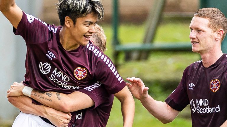 PERTH, SCOTLAND - AUGUST 05: Hearts' Yutaro Oda celebrates with teammates after scoring to make it 1-0 during a cinch Premiership match between St Johnstone and Heart of Midlothian at McDiarmid Park, on August 05, 2023, in Perth, Scotland. (Photo by Roddy Scott / SNS Group)