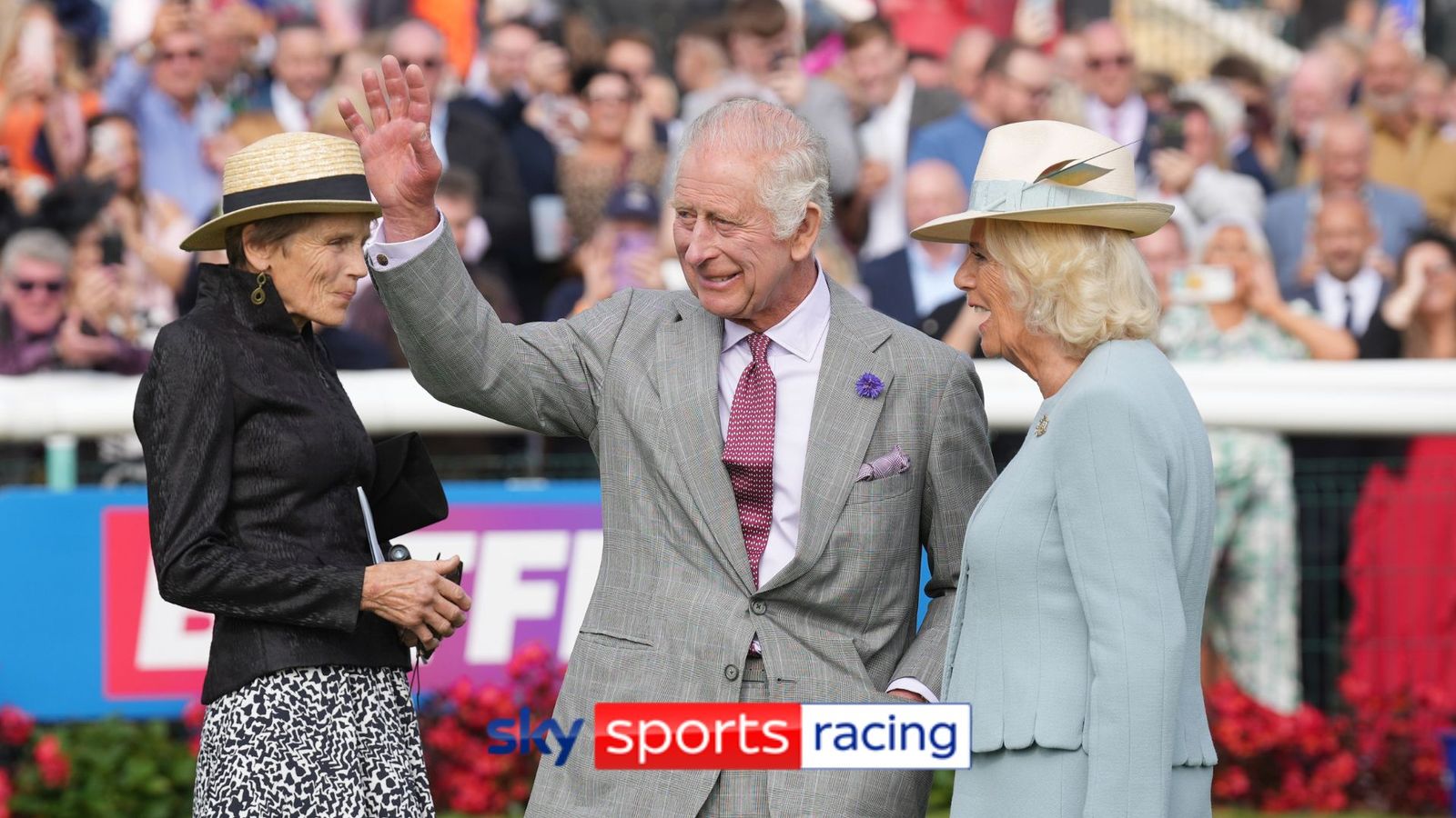 St Leger: King Charles III and Queen Camilla shake hands with Doncaster ...