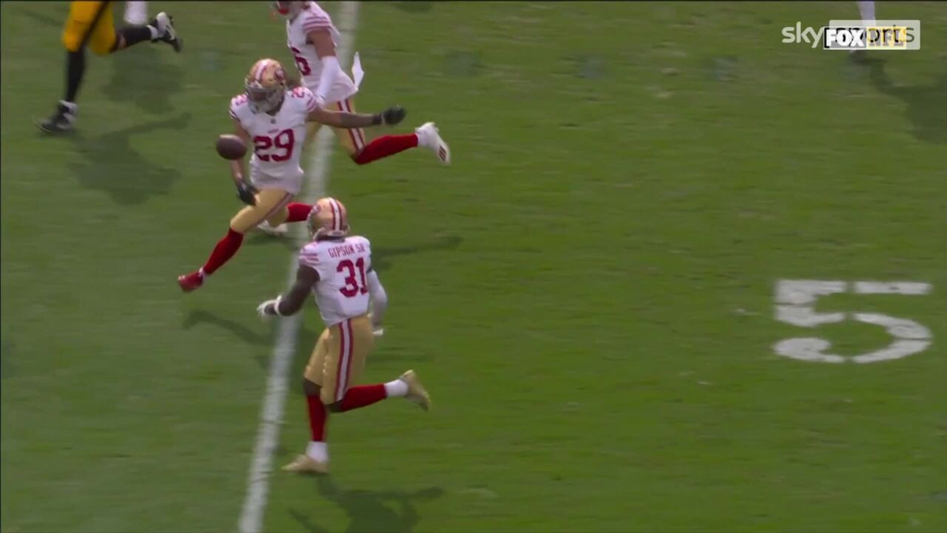Hufanga attempts rugby pass after interception!