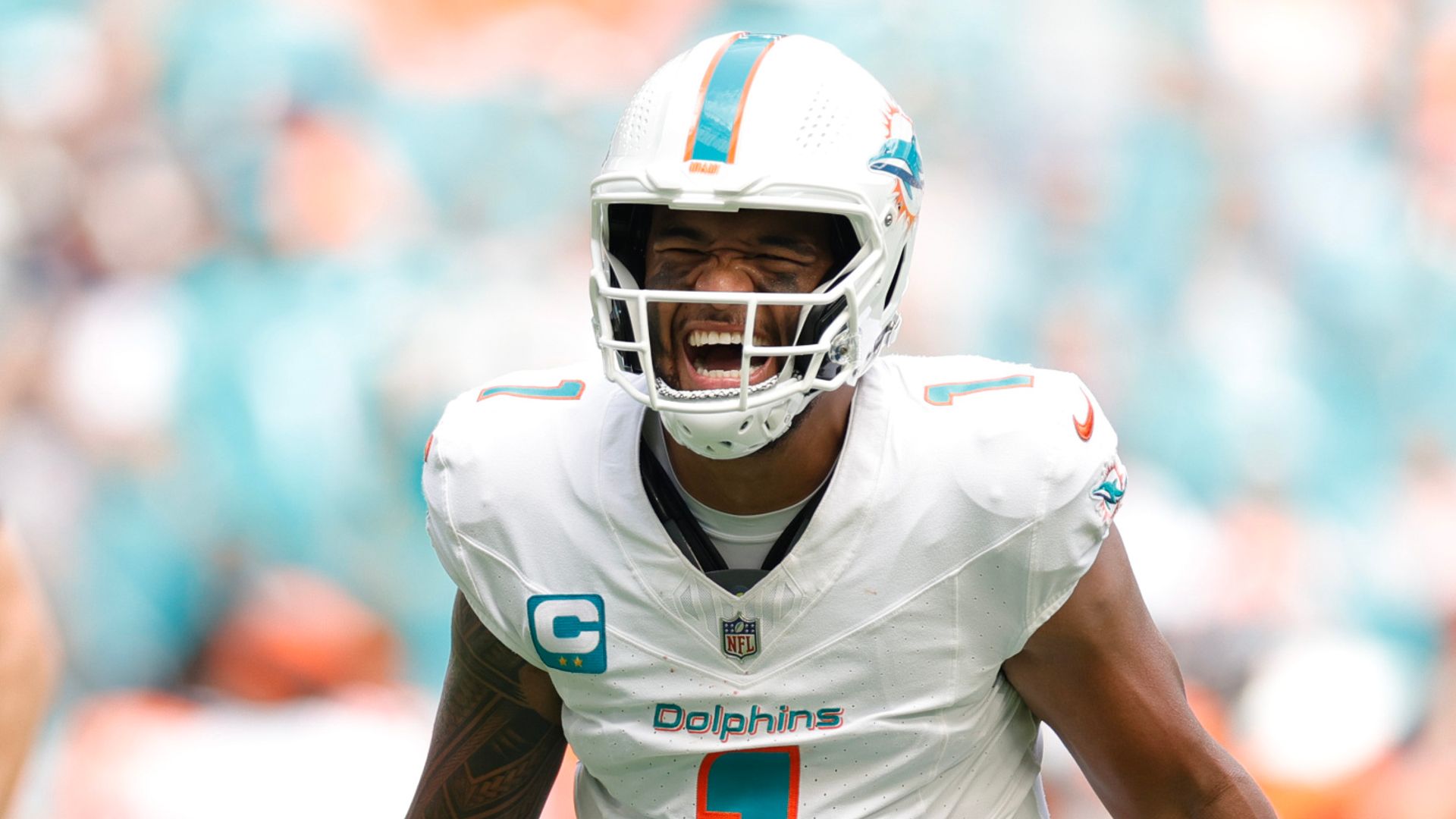 Dolphins score 70 points in record win over Broncos