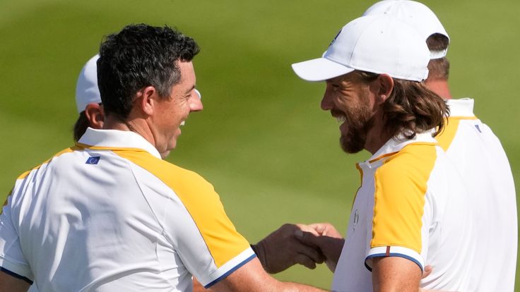 Europe's Rory Mcilroy, left shakes hands with Europe's Tommy Fleetwood after they completed a practice round ahed of the Ryder Cup at the Marco Simone Golf Club in Guidonia Montecelio, Italy, Tuesday, Sept. 26, 2023. The Ryder Cup starts Sept. 29, at the Marco Simone Golf Club. (AP Photo/Andrew Medichini)
