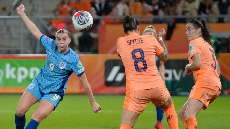 England's Alessia Russo, left, scores her side's first goal vs Netherlands 