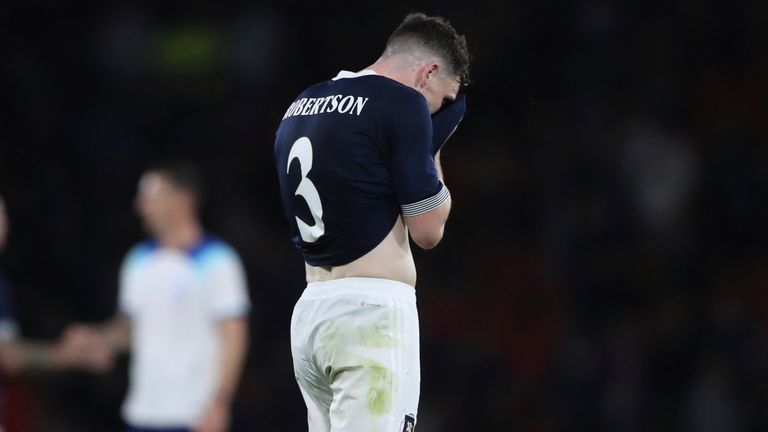 Andrew Robertson shows his dejection at Hampden Park