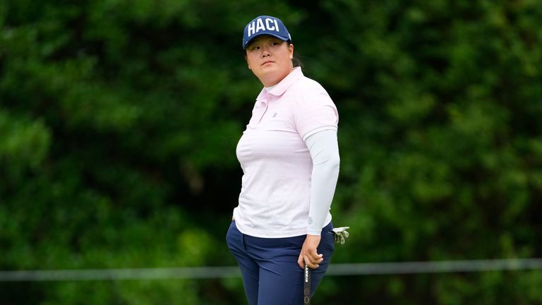 Angel Yin pauses on the first green during the first round of the Women's PGA Championship golf tournament, Thursday, June 22, 2023, in Springfield, N.J. (AP Photo/Matt Rourke)