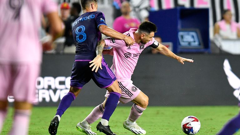 Ashley Westwood tackles Inter Miami's Lionel Messi