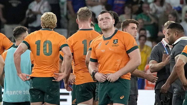 Australia's team gather after losing against Fiji at their Rugby World Cup Pool C match at the Stade Geoffroy Guichard in Saint-Etienne, France, Sunday, Sept. 17, 2023. (AP Photo/Laurent Cipriani)