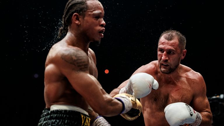 Boxers Sergey Kovalev of Russia, right, and Anthony Yarde of Britain exchange blows during their WBO light heavyweight title bout in Chelyabinsk, Russia, Saturday, Aug. 24, 2109.  (AP Photo/Anton Basanayev)