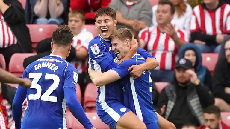 Cardiff City's Mark McGuinness (right) celebrates scoring their side's first goal of the game…