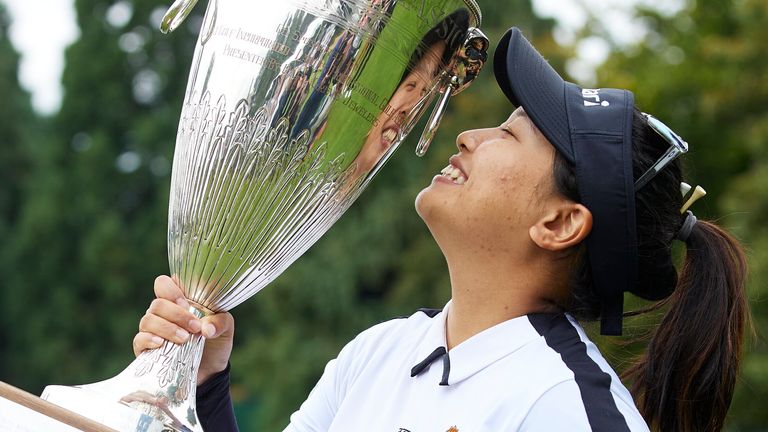 Chanettee Wannasaen, of Thailand, holds the trophy after winning the LPGA Portland Classic golf tournament in Portland, Ore., Sunday, Sept. 3, 2023. (AP Photo/Craig Mitchelldyer)