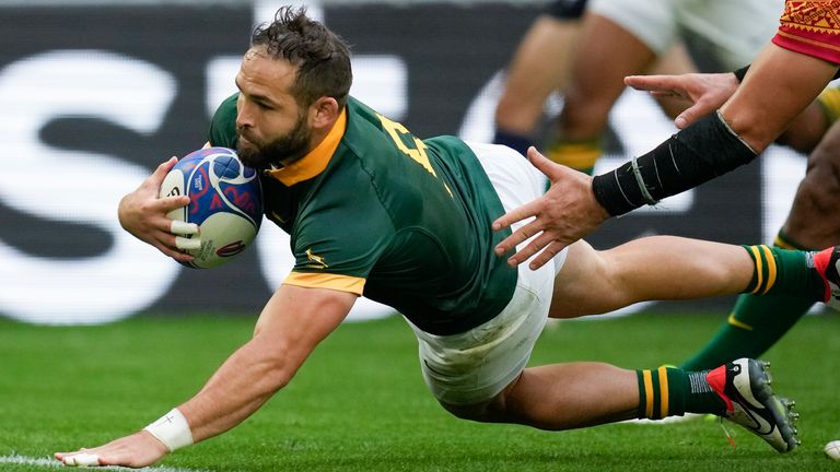Cobus Reinach goes over for one of his three tries in South Africa's win over Romania