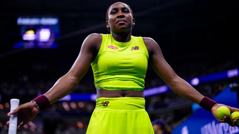 Coco Gauff, of the United States, reacts as protestors disrupt play between Gauff and Karolina Muchova, of the Czech Republic, during the women's singles semifinals of the U.S. Open tennis championships, Thursday, Sept. 7, 2023, in New York. (AP Photo/Manu Fernandez)