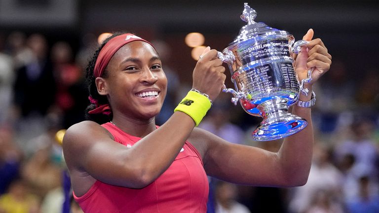 Coco Gauff, of the United States, holds up the championship trophy after defeating Aryna Sabalenka, of Belarus, in the women&#39;s singles final of the U.S. Open tennis championships, Saturday, Sept. 9, 2023, in New York. (AP Photo/Frank Franklin II)