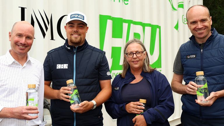 The image of (left to right, Andrew Cunningham, CEO of GeoPura, DP World Tour player Dan Bradbury, Sally Wood, Head of Golf Content at IMG, and Andrew Lynch, Head of Sustainability at DP World Tour) 