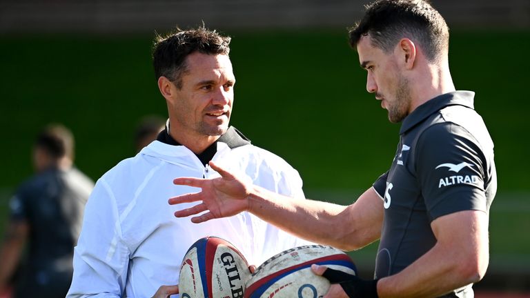 AUCKLAND, NEW ZEALAND - JUNE 30: Former All Blacks player Dan Carter runs through drills with Will Jordan of the All Blacks during a New Zealand All Blacks training session at Mt Smart Stadium on June 30, 2023 in Auckland, New Zealand. (Photo by Hannah Peters/Getty Images)